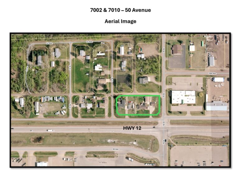 Aerial view of a residential area with a green-outlined property at 7002 & 7010 – 50 Avenue along Hwy 12.