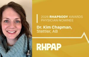 Stettler Physician & Ambulance Team Nominated For RHPAP Awards Portrait of a smiling female physician with a stethoscope, set against a gold panel that reads '2026 RHAPSODY AWARDS PHYSICIAN NOMINEE' on the right side.