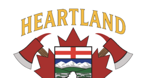 Heartland Regional Fire Issues Fire Advisory For County of Stettler Heartland Regional Fire Department emblem featuring a shield with mountains and fields, crossed axes, and a gold-edged banner reading Heartland above.
