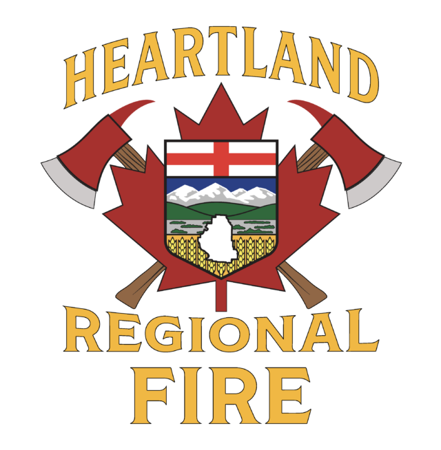 Heartland Regional Fire Department emblem featuring a shield with mountains and fields, crossed axes, and a gold-edged banner reading Heartland above.