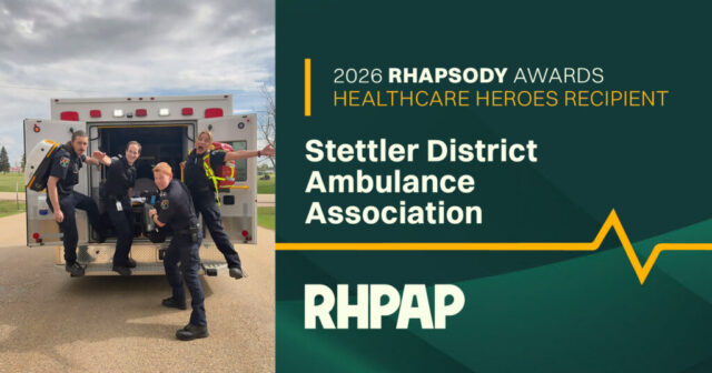 Rhapsody-socials-Stettler-Win-FB-1024x538 Five paramedics pose in front of an open ambulance, celebrating a healthcare heroes award ceremony on a sunny day.