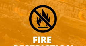 Fire Advisory Upgraded To Fire Restriction Across County of Stettler Fire restriction in effect message with an essential warning symbol and Heartland Regional Fire logo (orange background)