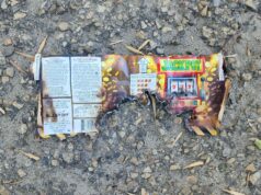 ‘Sounded Like Gunshots’: Fireworks Dropped From Vehicle Hit Stettler Neighbourhood Burnt fireworks wrapper with a Jackpot slot-machine graphic on a rocky, gravel surface.