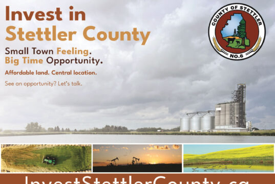 County of Stettler Launches New Investment Attraction Website Promotional banner: 'Invest in Stettler County' with a county seal on the right, showing industrial silos and a cloudy sky in the background.