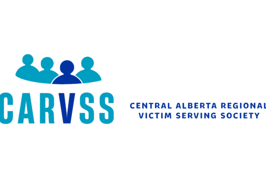 Victim Serving Society Calls For Local Crisis Volunteers CARVSS logo: four teal person icons with a dark blue center figure and the subtitle 'Central Alberta Regional Victim Serving Society'.